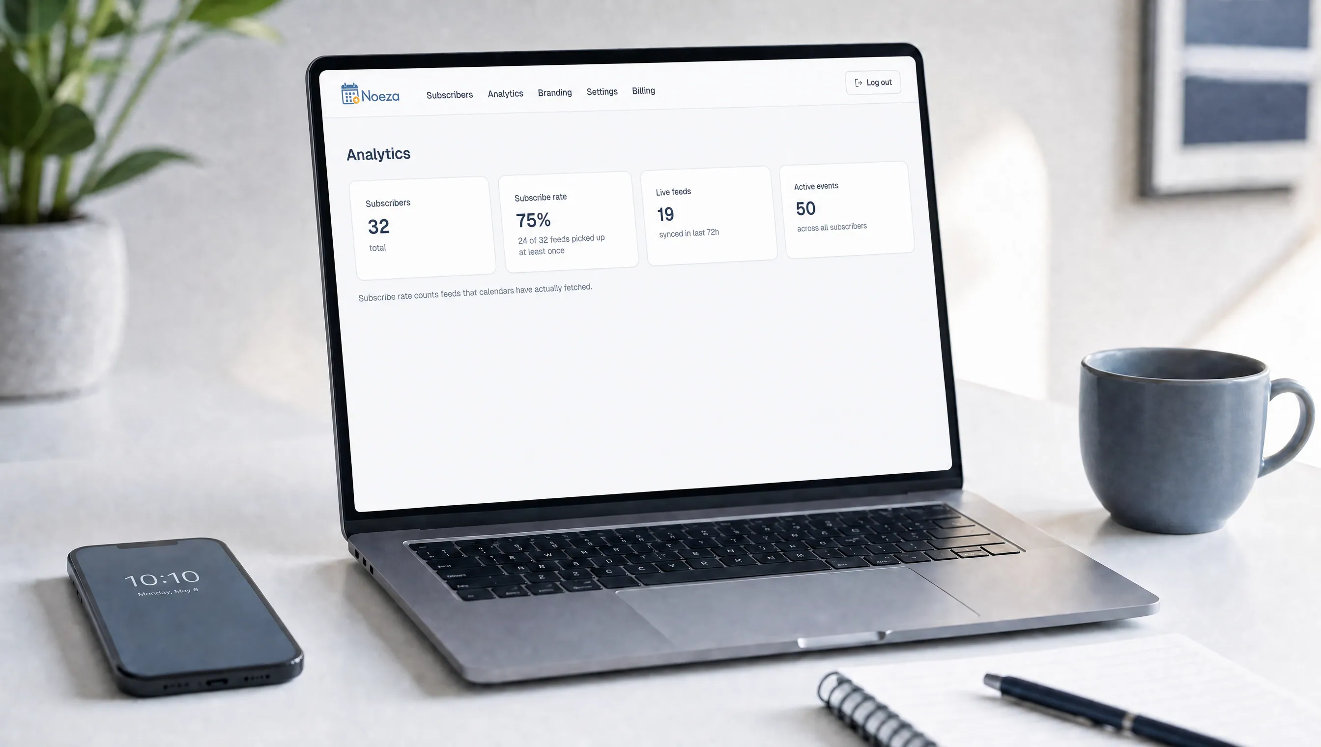 A clean laptop dashboard view with simple subscribe-rate numbers
